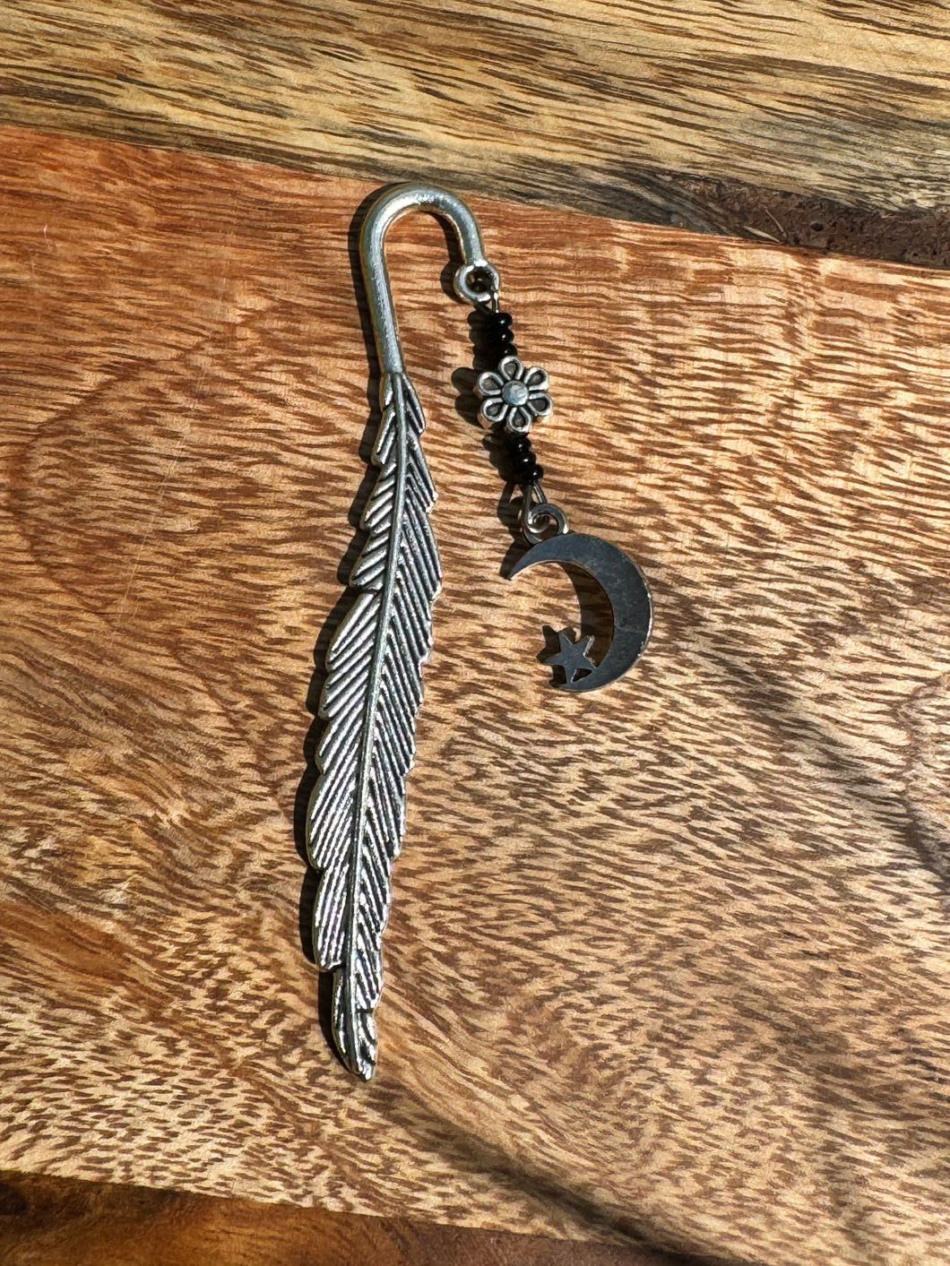 Metal bookmark with moon charm