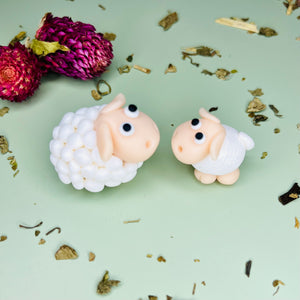 Sheep and lamb pair of figures